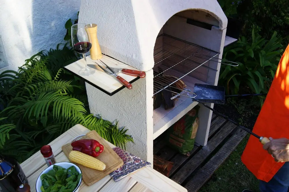 Grill with hood with prep table and ingredients