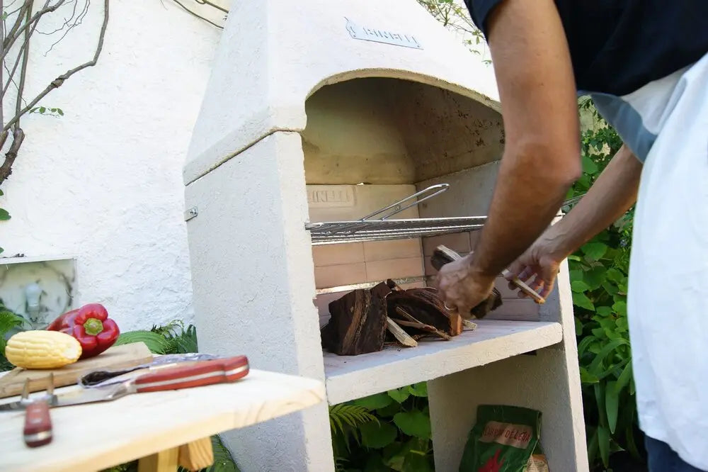 Fire pit grill with hood.