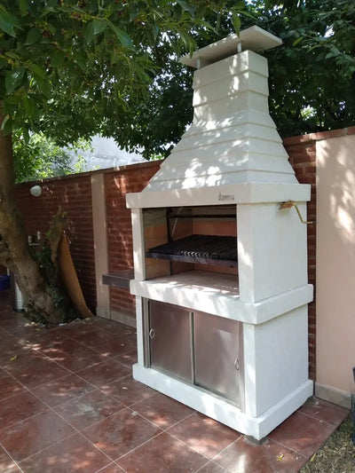 Argentine Grill N01 against a brick wall, with optional sliding doors