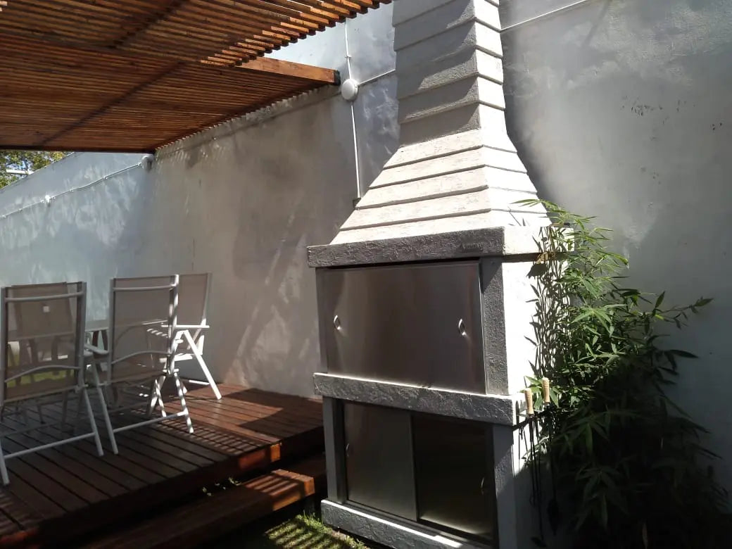 Argentine Grill N01 on a deck, with optional sliding doors